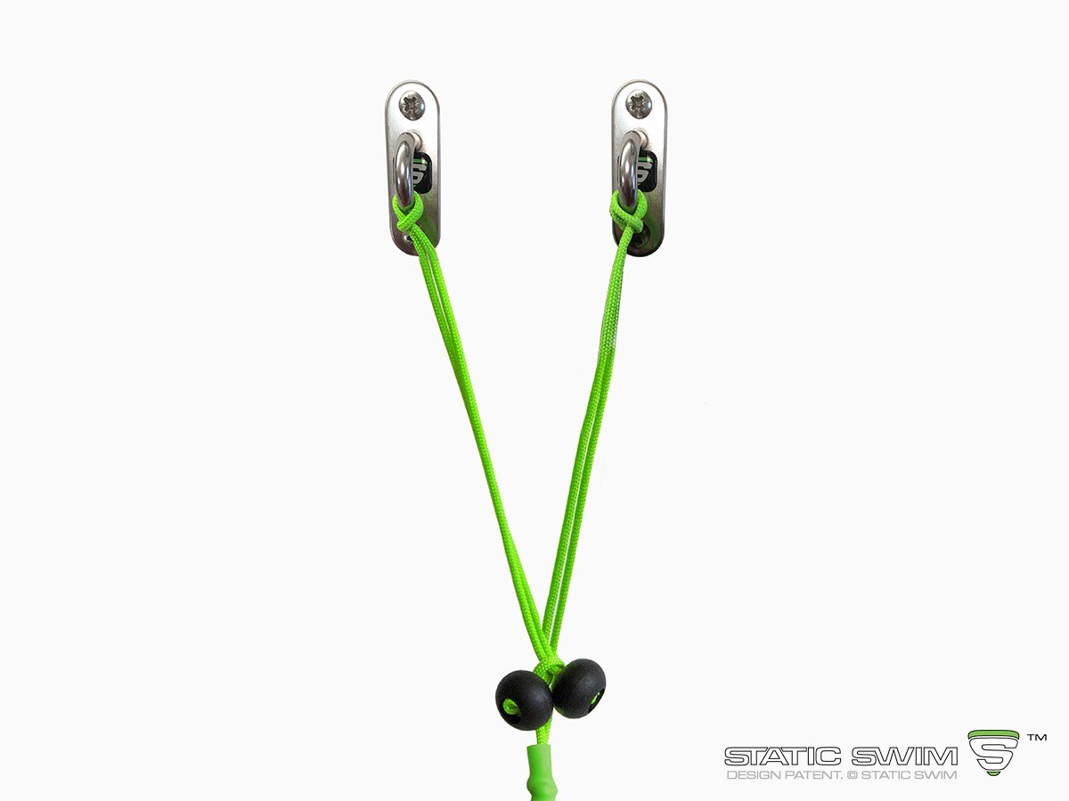 Sophisticated and unique, the length of STATIC SWIM™ attachment device enables you to attach your equipment to any wall up to 7 meters from your pool. The length is adjusted by tying a simple knot at the stopper (black ball). The excess cord is then cut of